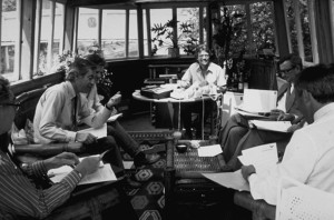 Richard Branson working with his team on a houseboat Richard Branson working with his team on a houseboat