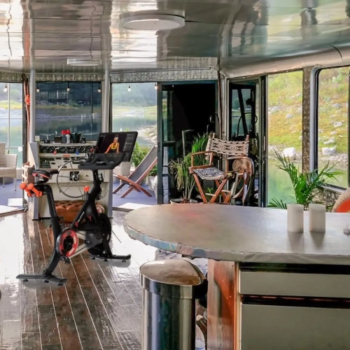 Peloton on Board of NaturaReserve Houseboat-Yacht Peloton on Board of NaturaReserve Houseboat-Yacht